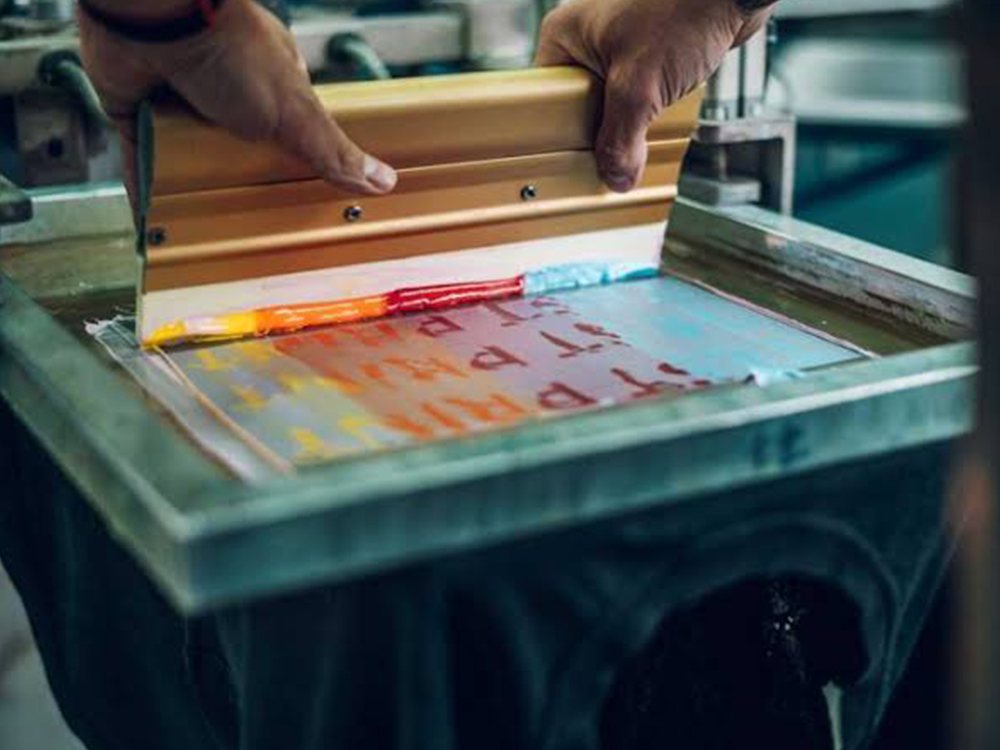 Live screen printing at a school event in North County San Diego